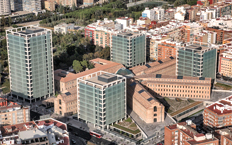 Aerial view of the complete 9 de Octubre administrative complex, consisting of four towers and a central star-shaped building.